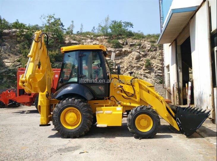 Caricatore a pala posteriore con escavatore anteriore