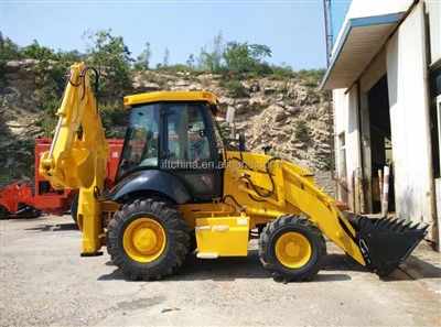 Caricatore a pala posteriore con escavatore anteriore